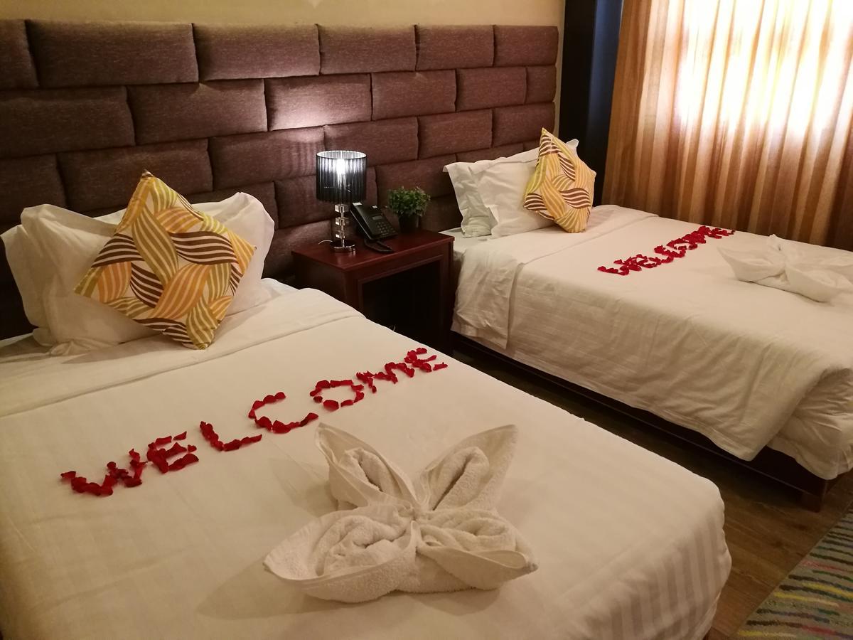 Great Wall Hotel دار السلام الغرفة الصورة